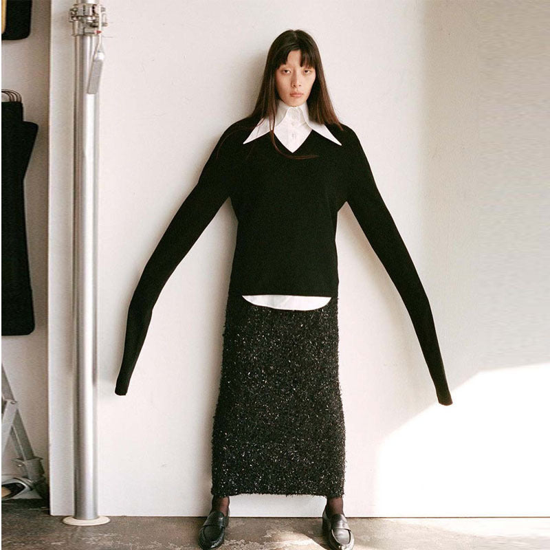 Pull élégant et décontracté en tricot pour femmes avec col en V et manches longues Chic & Stil