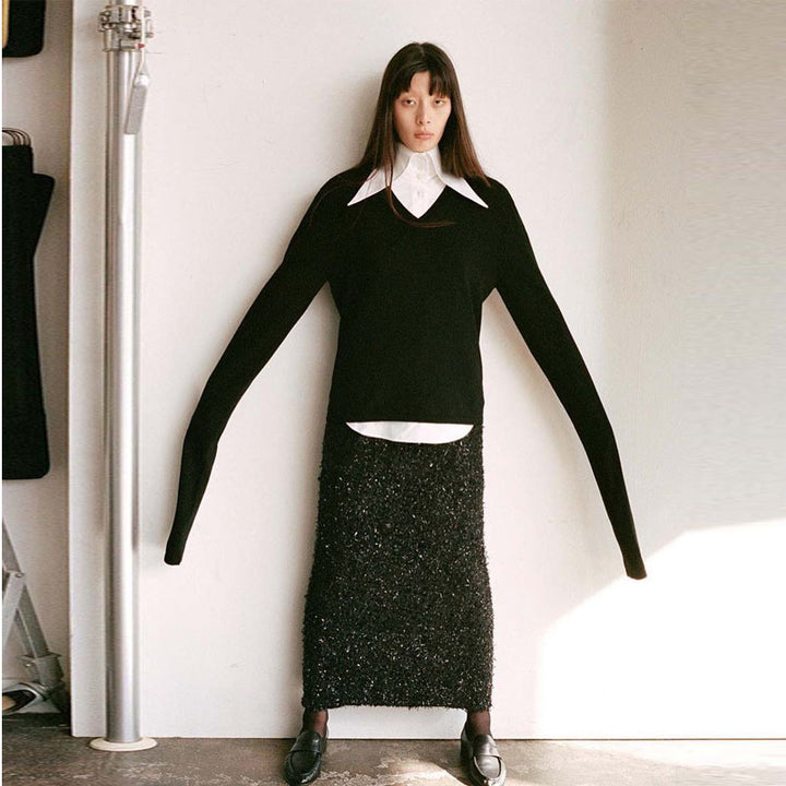Pull élégant et décontracté en tricot pour femmes avec col en V et manches longues Chic & Stil