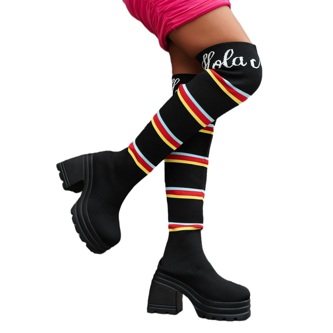 Women's boots in portrait format with colorful striped pattern and trendy block heel Lune London