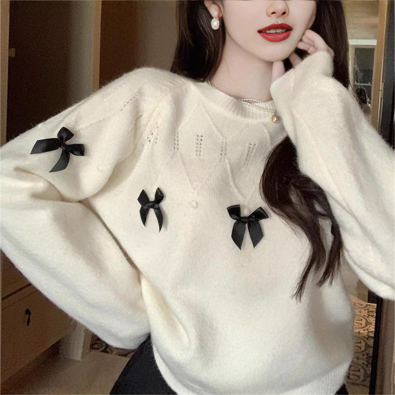 Pull confortable pour femmes avec des appliqués en nœud ludiques Chic & Stil