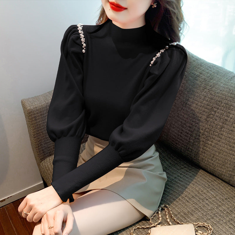 Elegant sweater for women with puff sleeves and pearl details Lune London