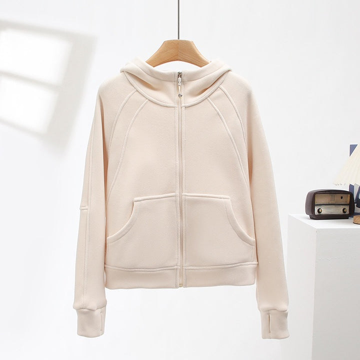 Veste à capuche confortable pour femme avec col montant et poches pratiques Chic & Stil