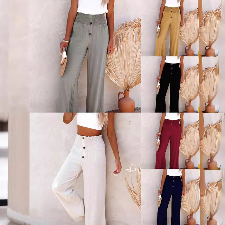 Women's wide-leg linen pants with elastic waistband and button details Lune London