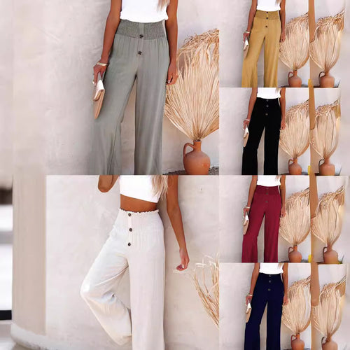 Women's wide-leg linen pants with elastic waistband and button details Lune London