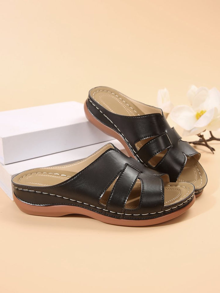 Comfortable slippers for ladies with ergonomic sole and trendy bands Lune London