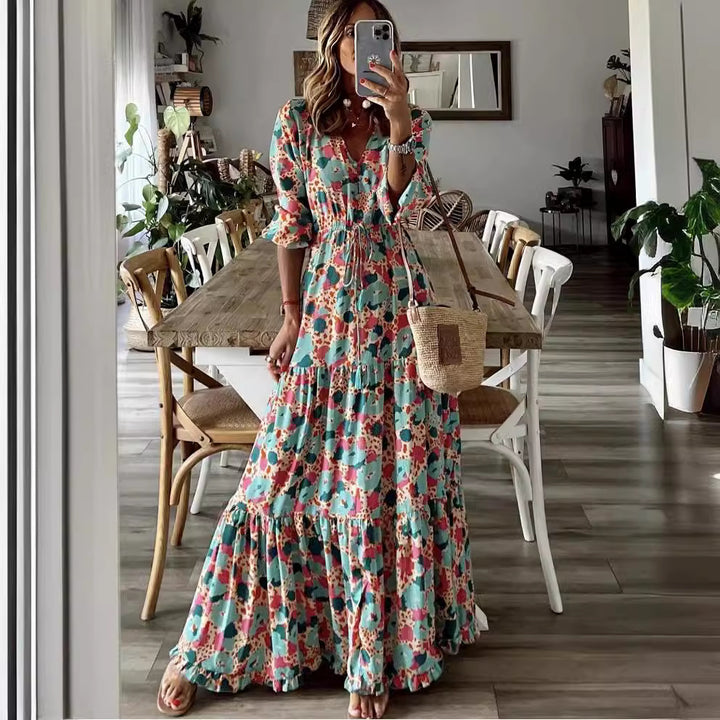 Maxi dress for women with a knotted V-neckline and voluminous sleeves Lune London