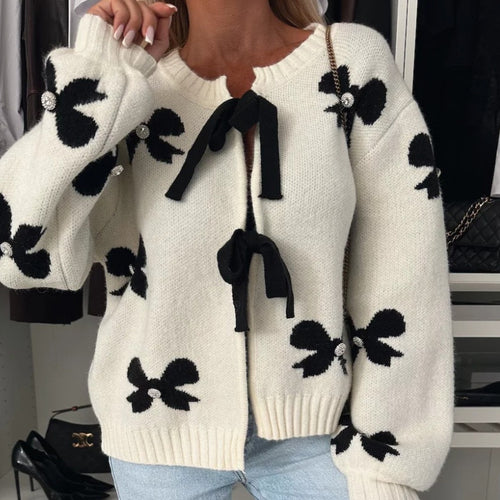 Women's cardigan with decorative knots and shiny accents Lune London