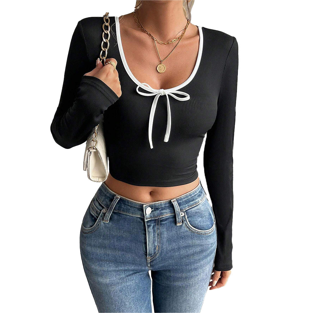 Haut court à manches longues pour femmes avec nœud décoratif et structure ribbed élégante Chic & Stil