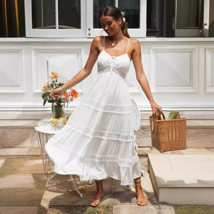 Robe maxi femme avec un nœud ludique et de délicates volants Chic & Stil