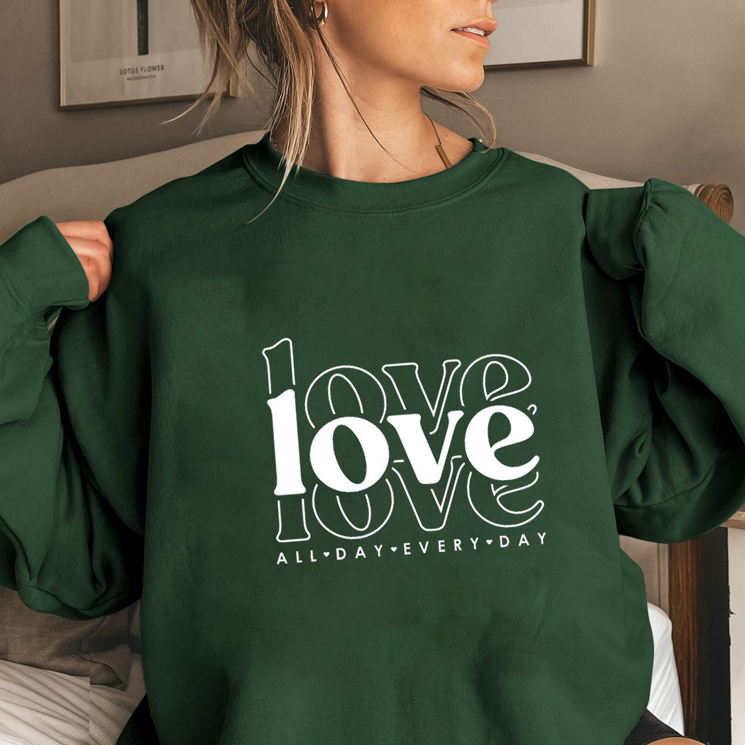 Sweat-shirt pour femmes avec des manches volumineuses et imprimé moderne "love" Chic & Stil