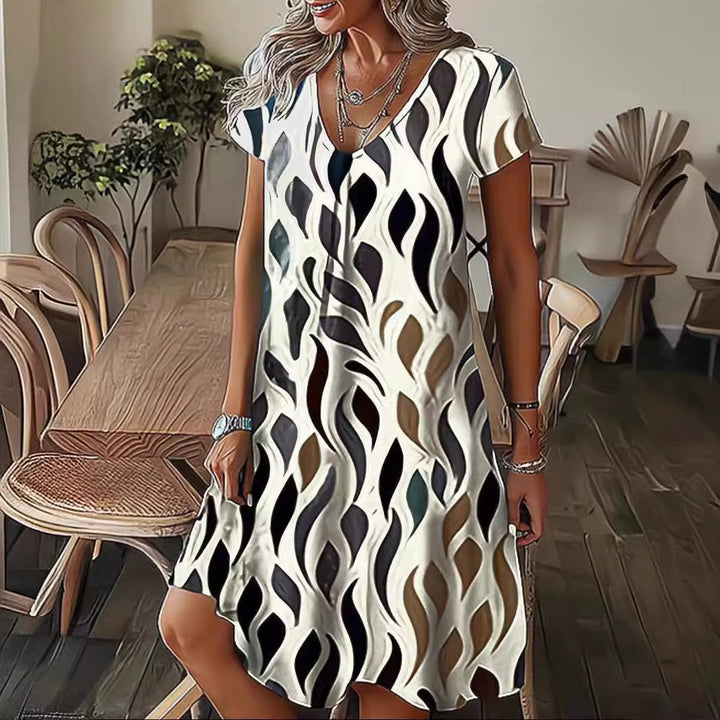 Fluid V-neck midi dress for women with abstract pattern Lune London