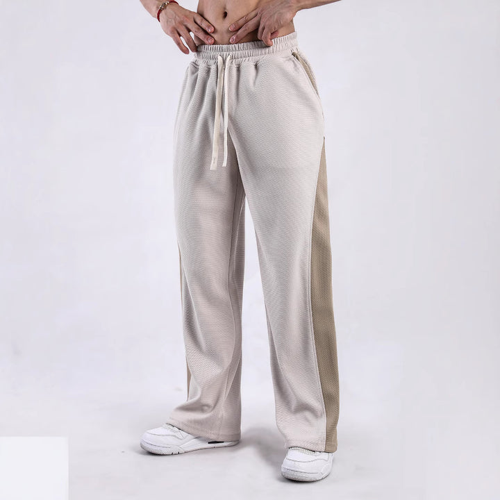 Men's sporty leisure pants with side ventilation openings and elastic waist Lune London