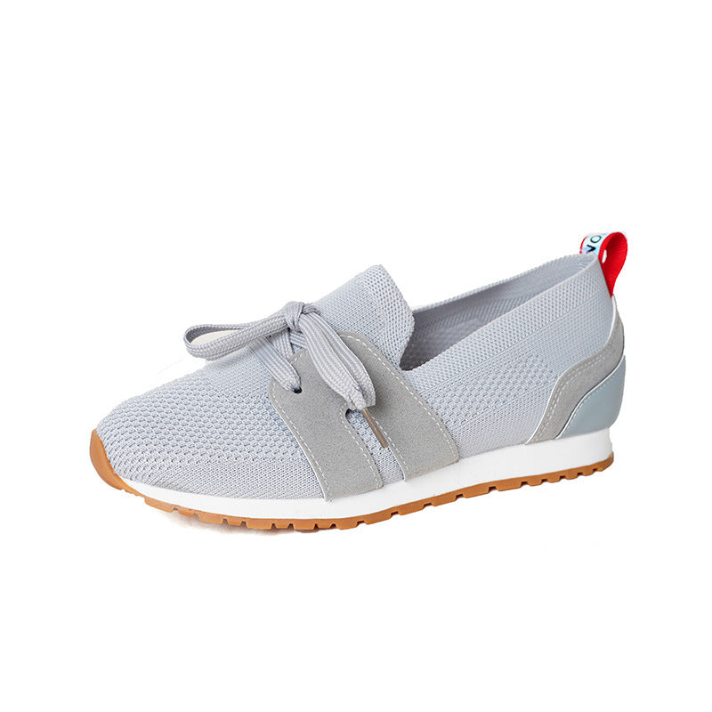 Women's sports sneakers with a breathable knitted upper and elastic accents Lune London