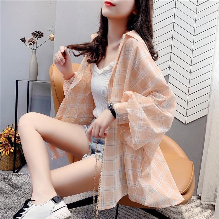 Chemise blouse décontractée à carreaux pour femmes avec coupe ample Chic & Stil