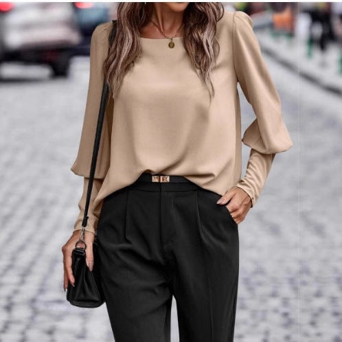 Elegant women's blouse with puff sleeve details and structured fabric Lune London