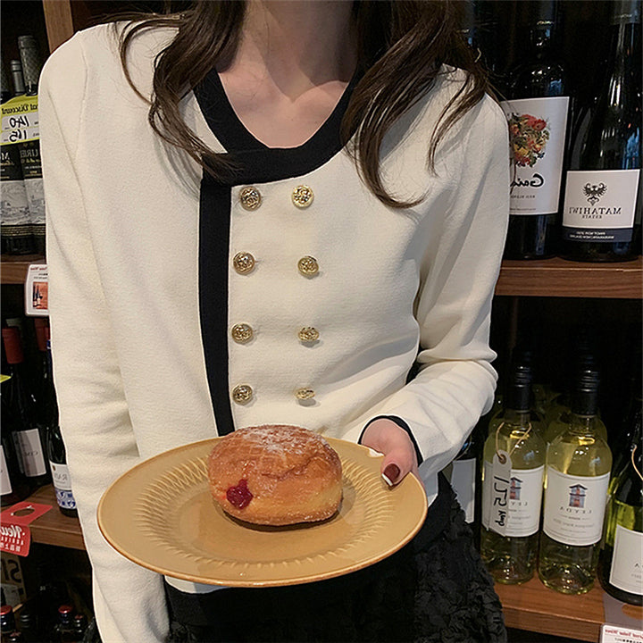 Elegant ladies cardigan with gold button details and contrasting finishes Lune London