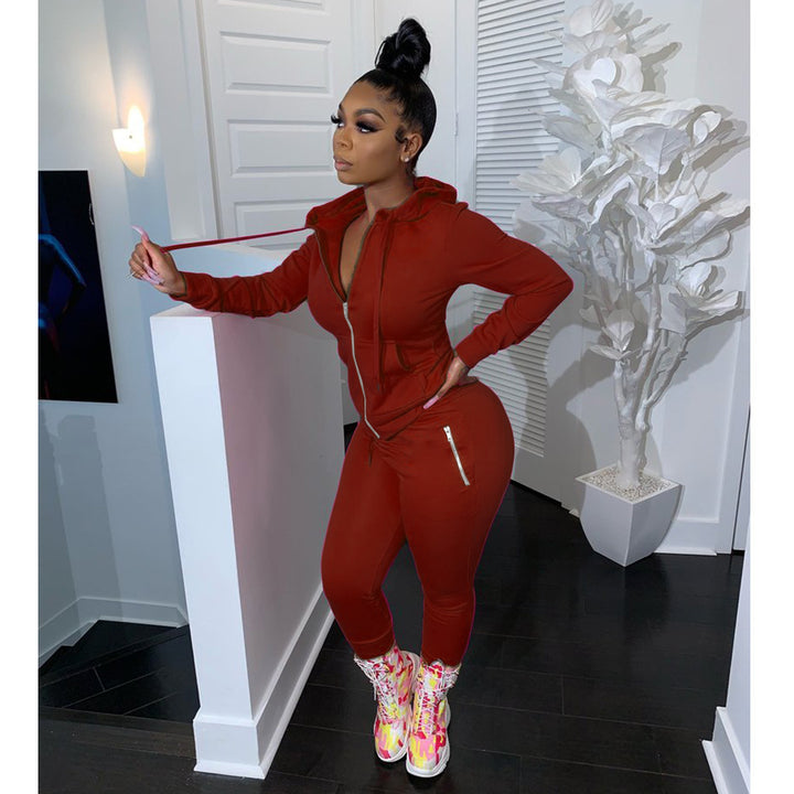 Ladies sporty jumpsuit with a fitted cut and hood Lune London