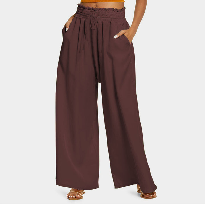 Wide palazzo pants for women with elastic waistband and practical pockets Lune London
