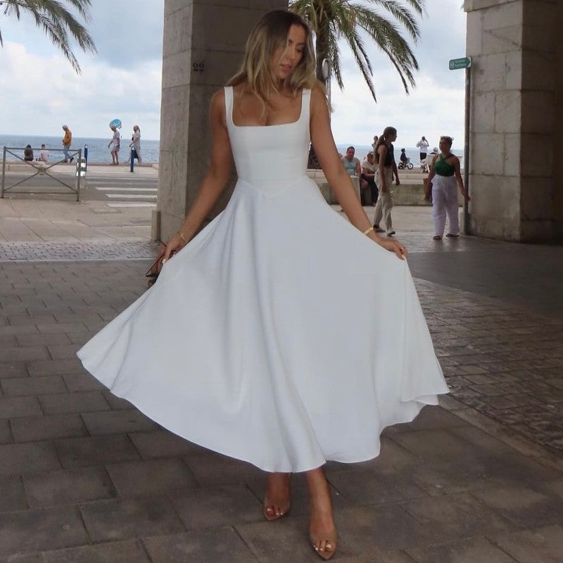 Women's evening dress with square neckline and flowing skirt Lune London