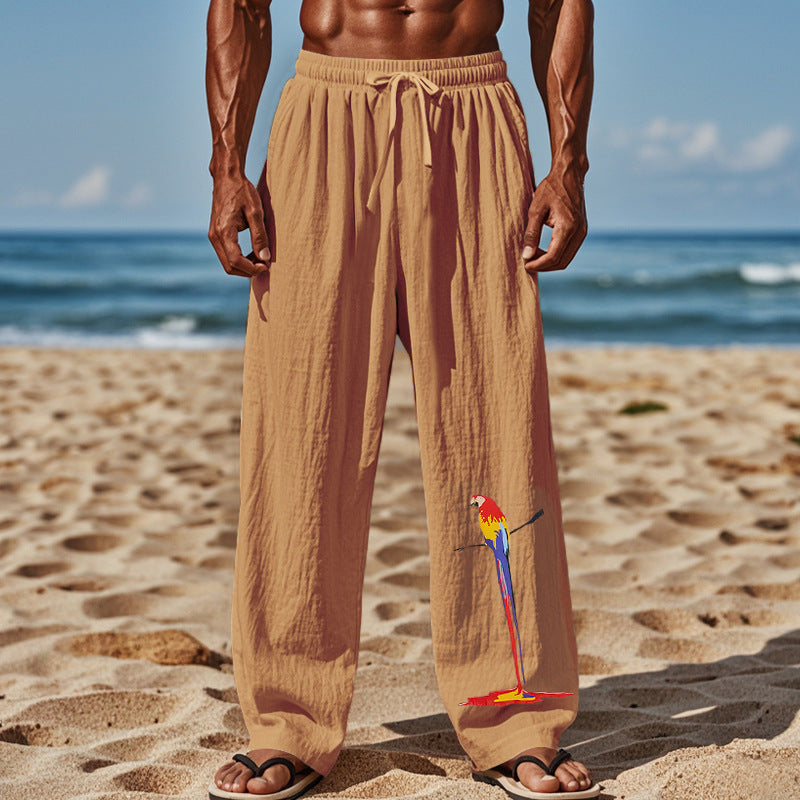 Casual beach pants for men with elastic waistband and colorful bird pattern Lune London