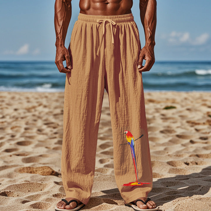 Casual beach pants for men with elastic waistband and colorful bird pattern Lune London