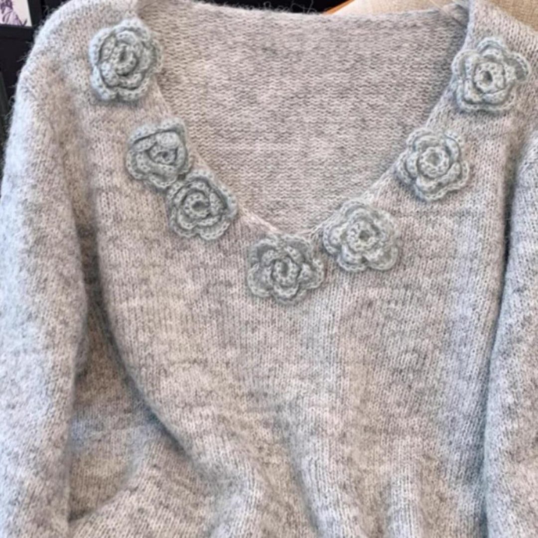 Pull en maille pour femmes avec accents floraux Chic & Stil