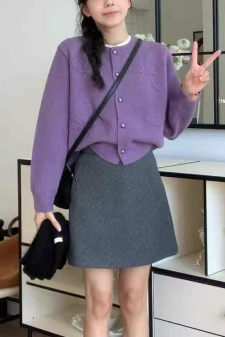 Ladies comfortable short sleeve knitted cardigan with high quality button details Lune London