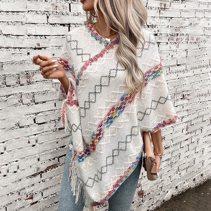 Elegant oversized sweater for women with fringe hem and unique pattern Lune London