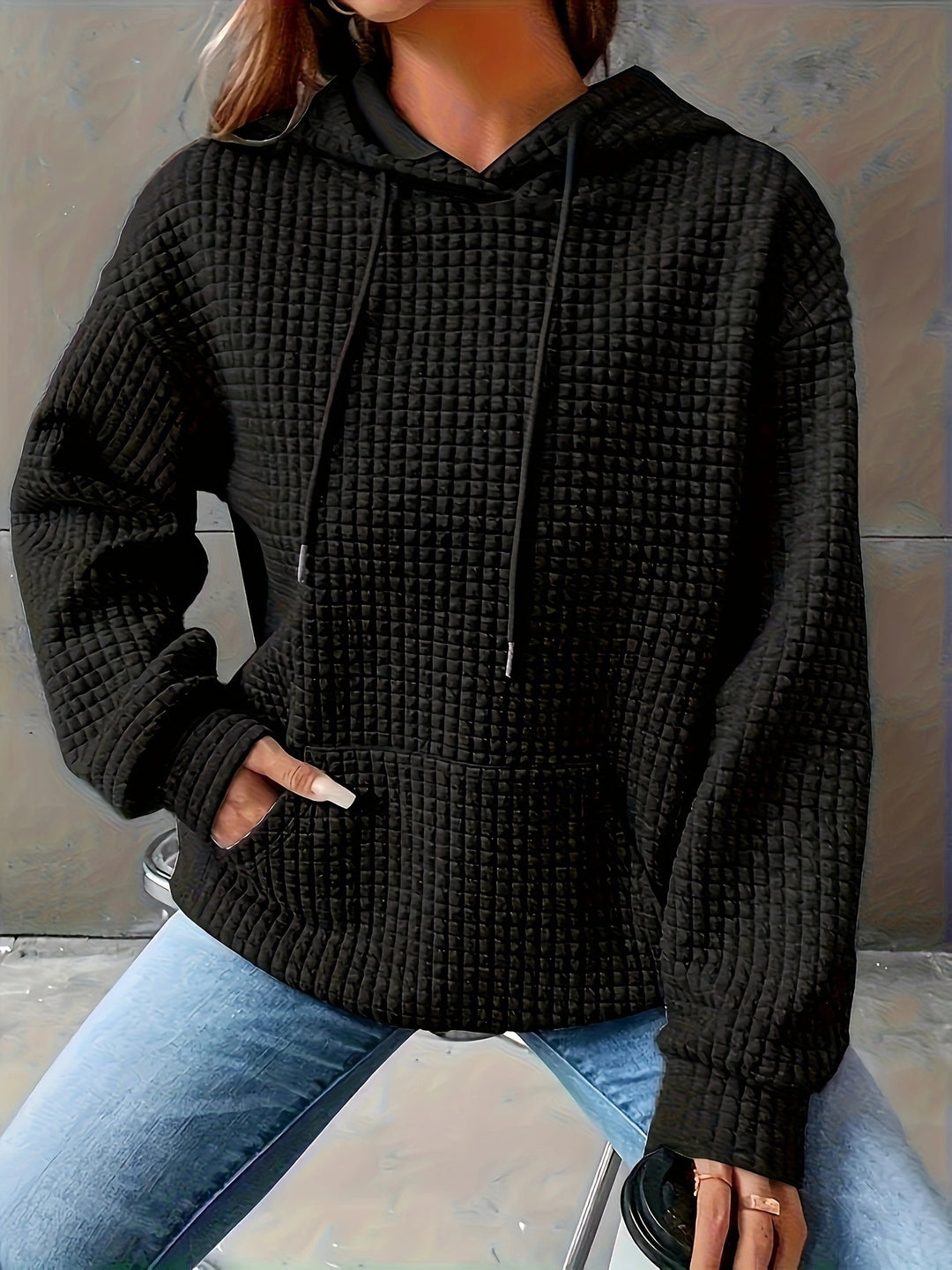 Sweat à capuche femme en motif waffle texturé avec poches latérales Chic & Stil