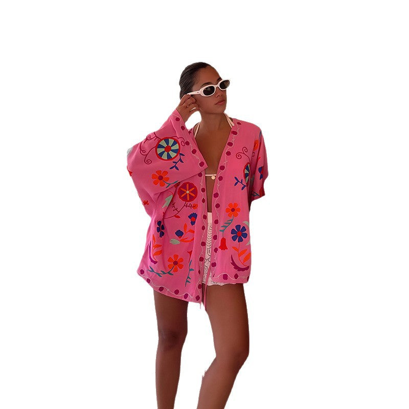 Ladies beach kimono with colorful floral pattern and relaxed fit Lune London