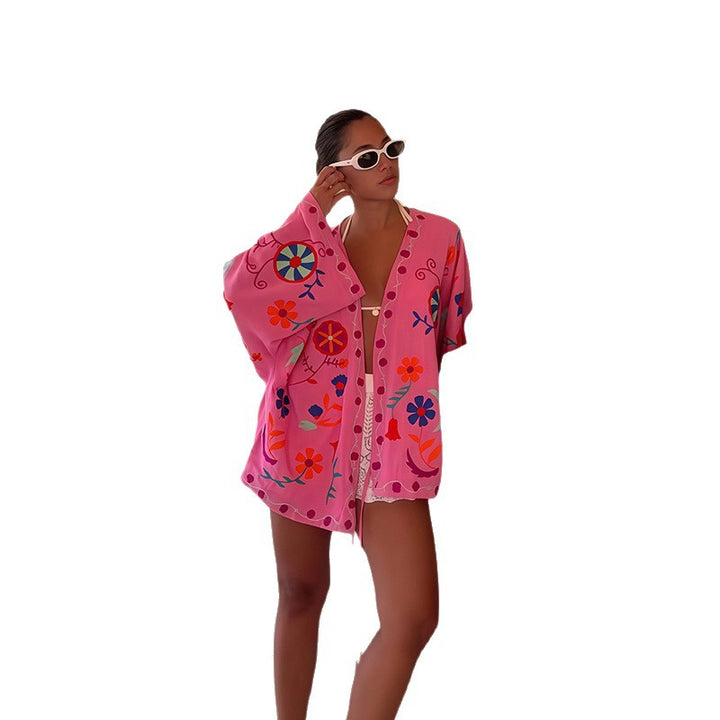 Ladies beach kimono with colorful floral pattern and relaxed fit Lune London