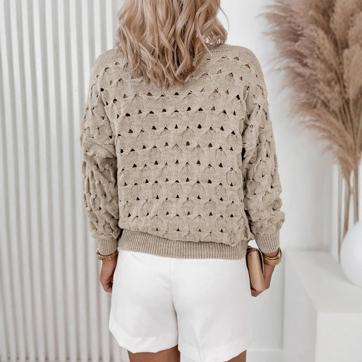 Women's knitted jacket with an airy knit structure and elegant button details Lune London
