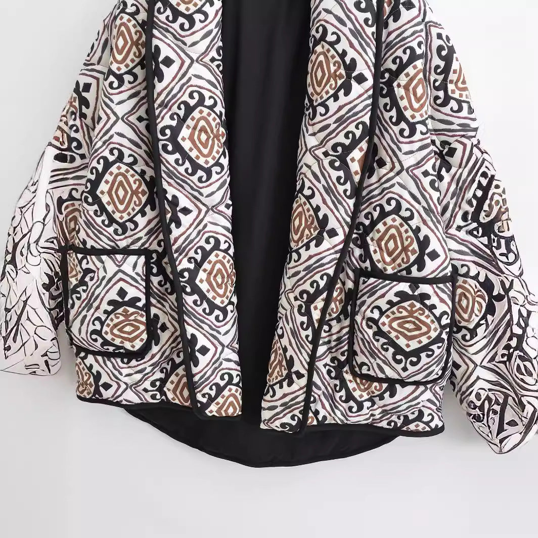 Veste matelassée élégante pour femmes avec ceinture à la taille et manches larges Chic & Stil