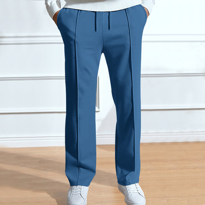 Men's leisure pants with elastic waistband and side snap buttons Lune London