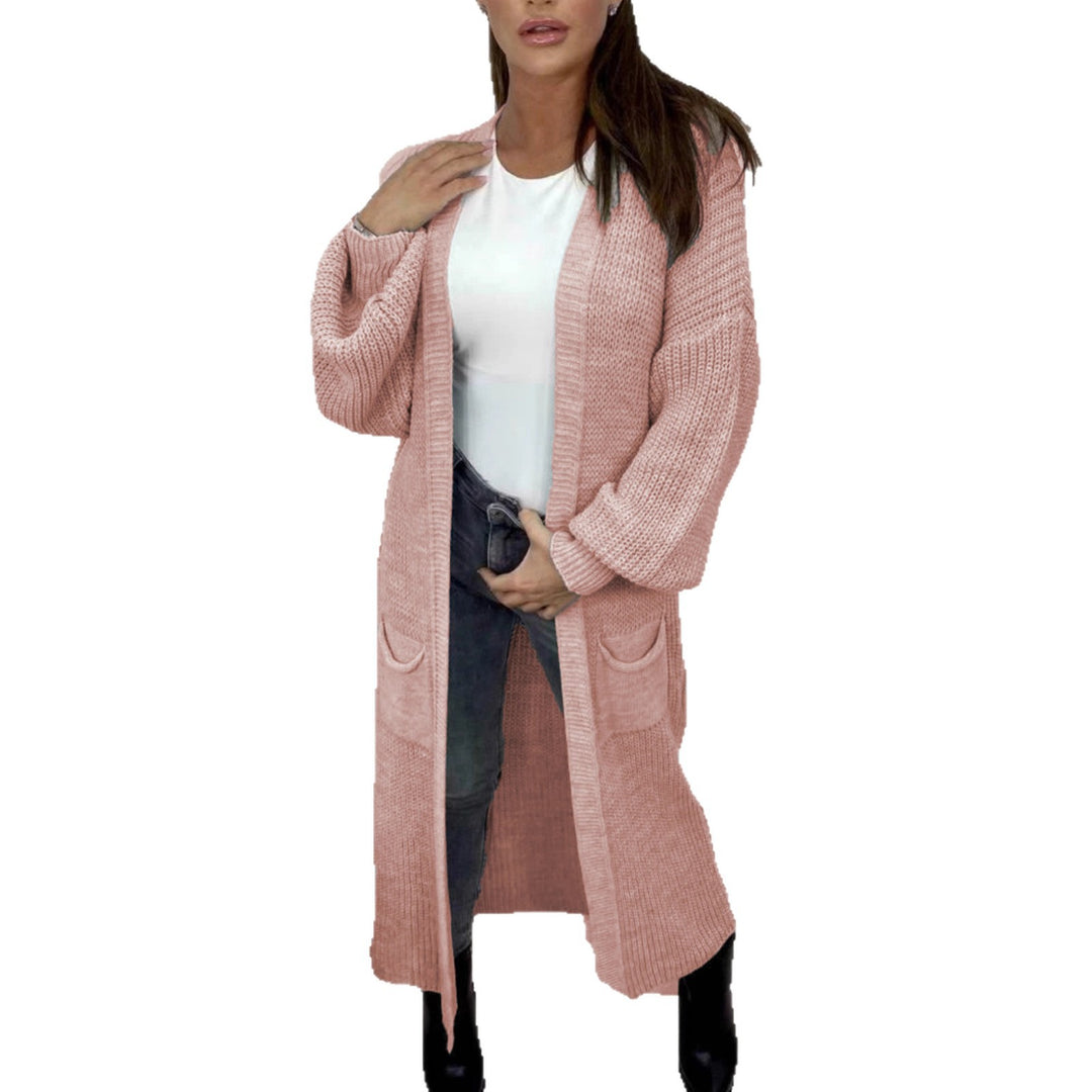 Ladies Long knitted cardigan with a textured knit look and practical pockets Lune London