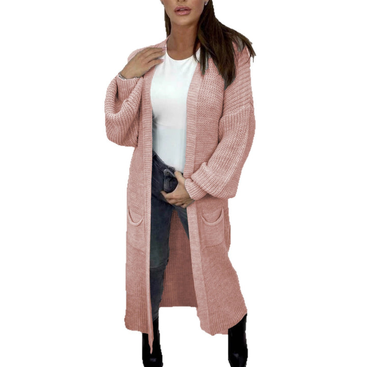 Ladies Long knitted cardigan with a textured knit look and practical pockets Lune London