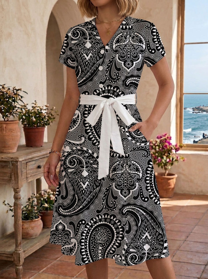 Women's casual maxi dress with adjustable knot and decorative check pattern Lune London