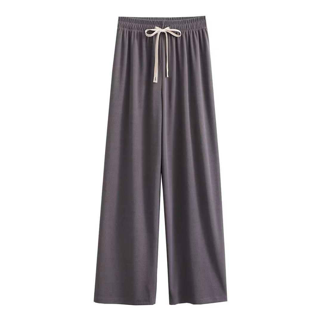 Wide palazzo pants for ladies with elastic waistband and decorative cord Lune London