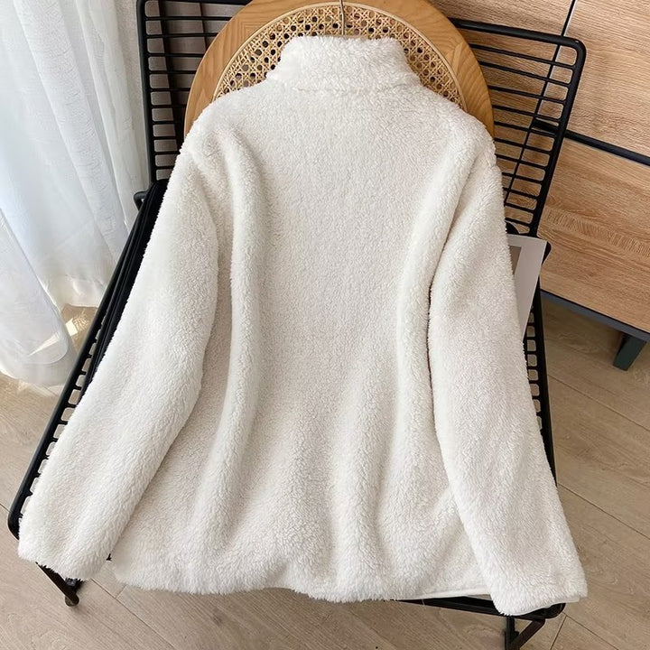 Veste en polaire confortable pour femmes avec col montant et fermeture éclair latérale Chic & Stil