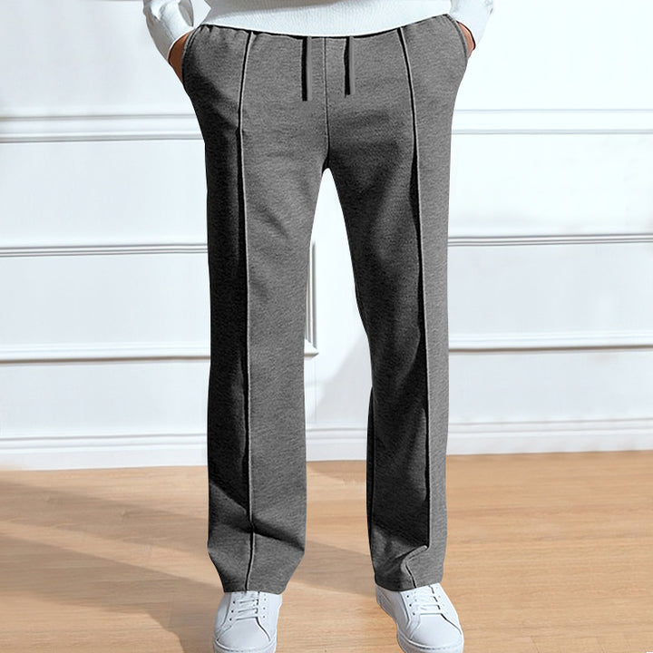 Men's leisure pants with elastic waistband and side snap buttons Lune London
