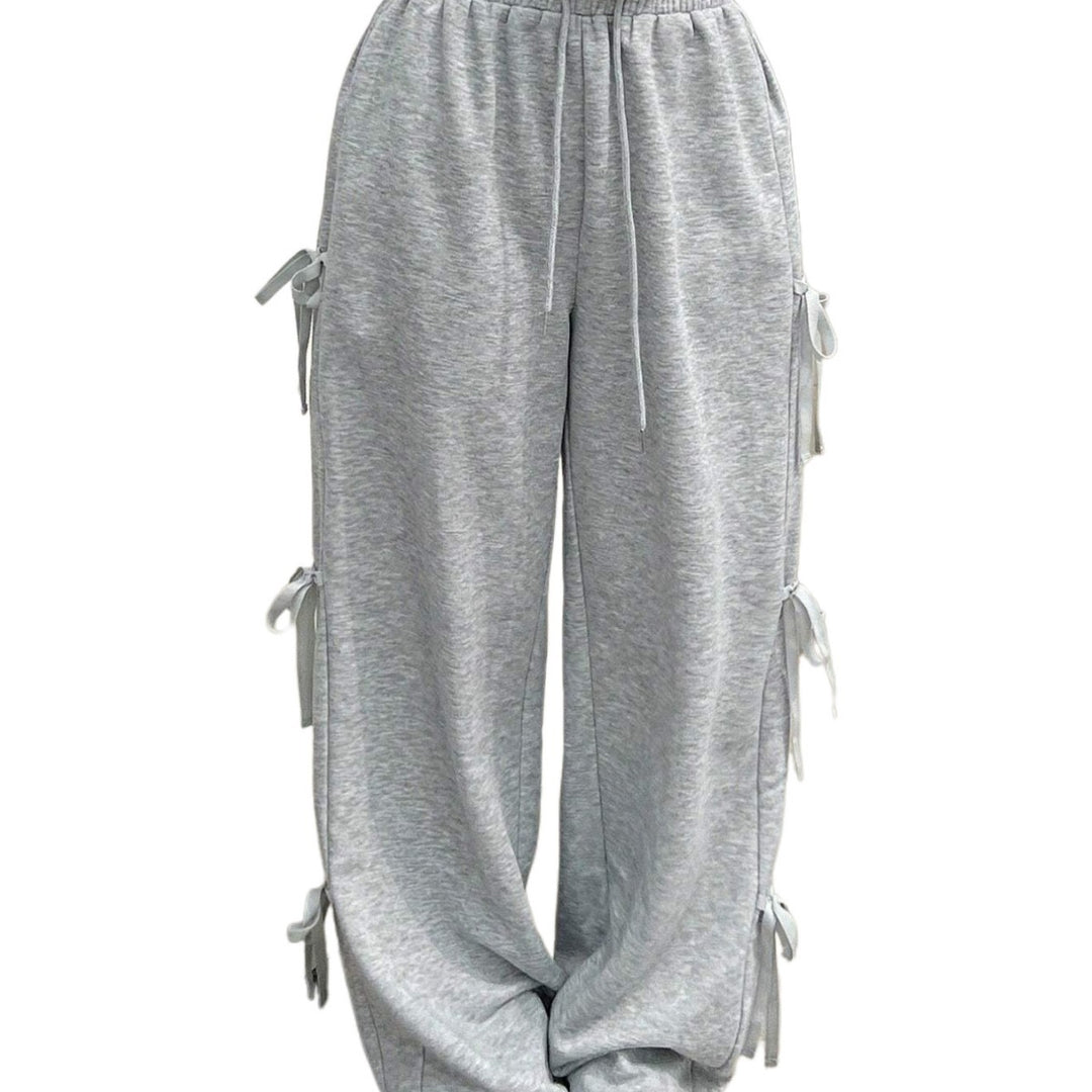 Pantalons décontractés pour femmes avec détails de volants sur les côtés et taille élastique Chic & Stil