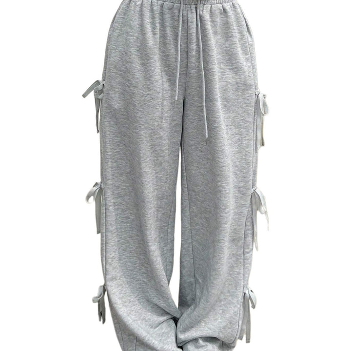 Pantalons décontractés pour femmes avec détails de volants sur les côtés et taille élastique Chic & Stil