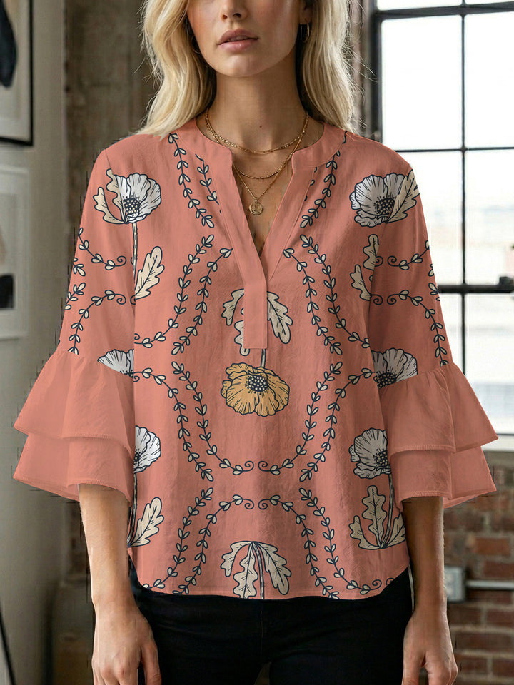 Women's blouse with voluminous ruffle sleeves and creative floral design Lune London