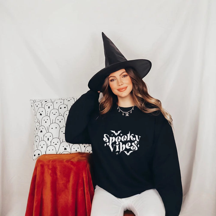 Sweat à capuche pour femmes avec un design Halloween ludique et une coupe confortable Chic & Stil