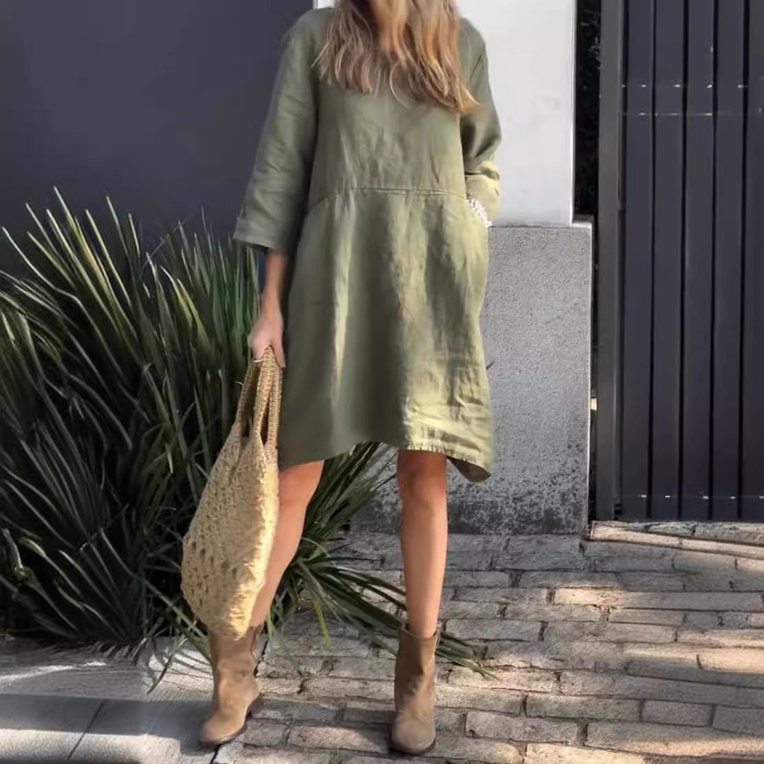 Casual linen dress for women with practical pockets and asymmetrical hem Lune London