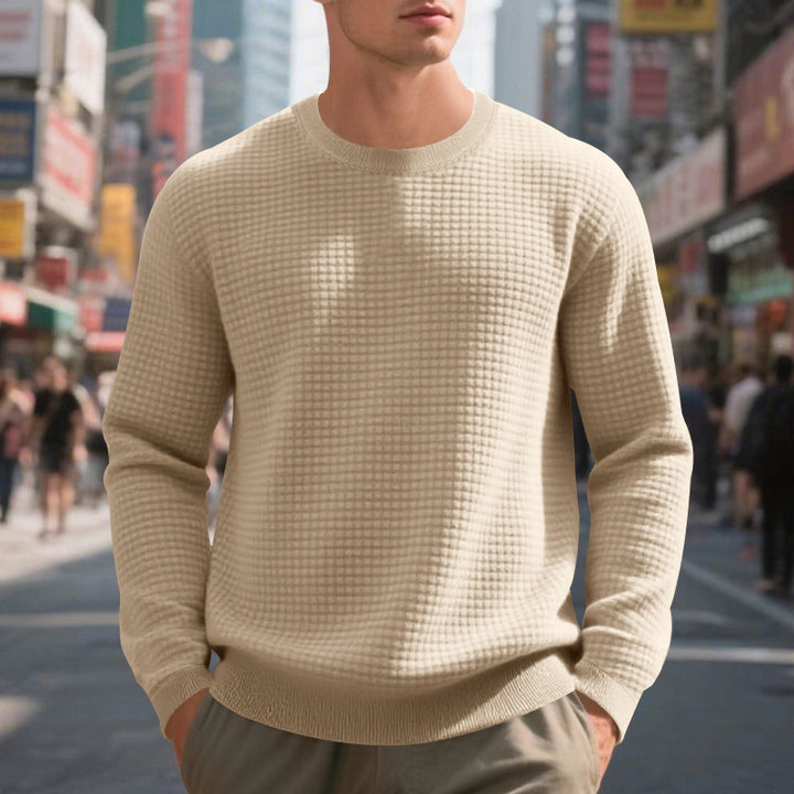 Elegant structured knit sweater for men with a round neck and comfortable feel. Chic and style