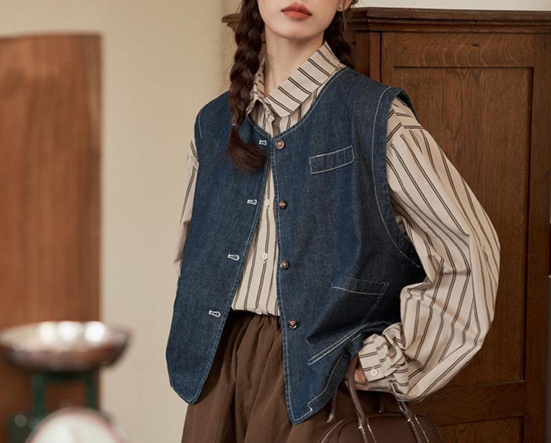 Gilet en denim pour femmes avec fermeture à boutons et poches Chic & Stil