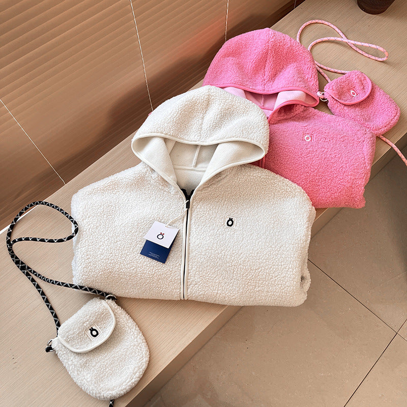 Veste en polaire confortable pour femmes avec capuche et sac à épaule pratique Chic & Stil