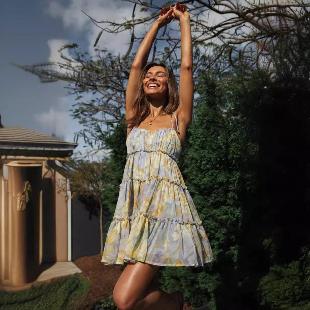 Robe d'été aérienne pour femmes avec de délicates volants et des bretelles spaghetti Chic & Stil