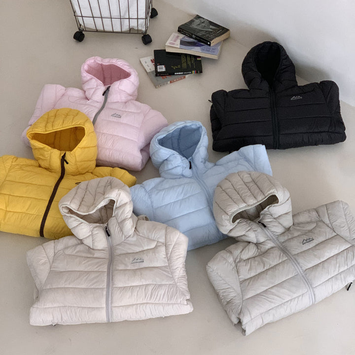 Ladies ultralight down jacket with removable hood and elastic hem Lune London